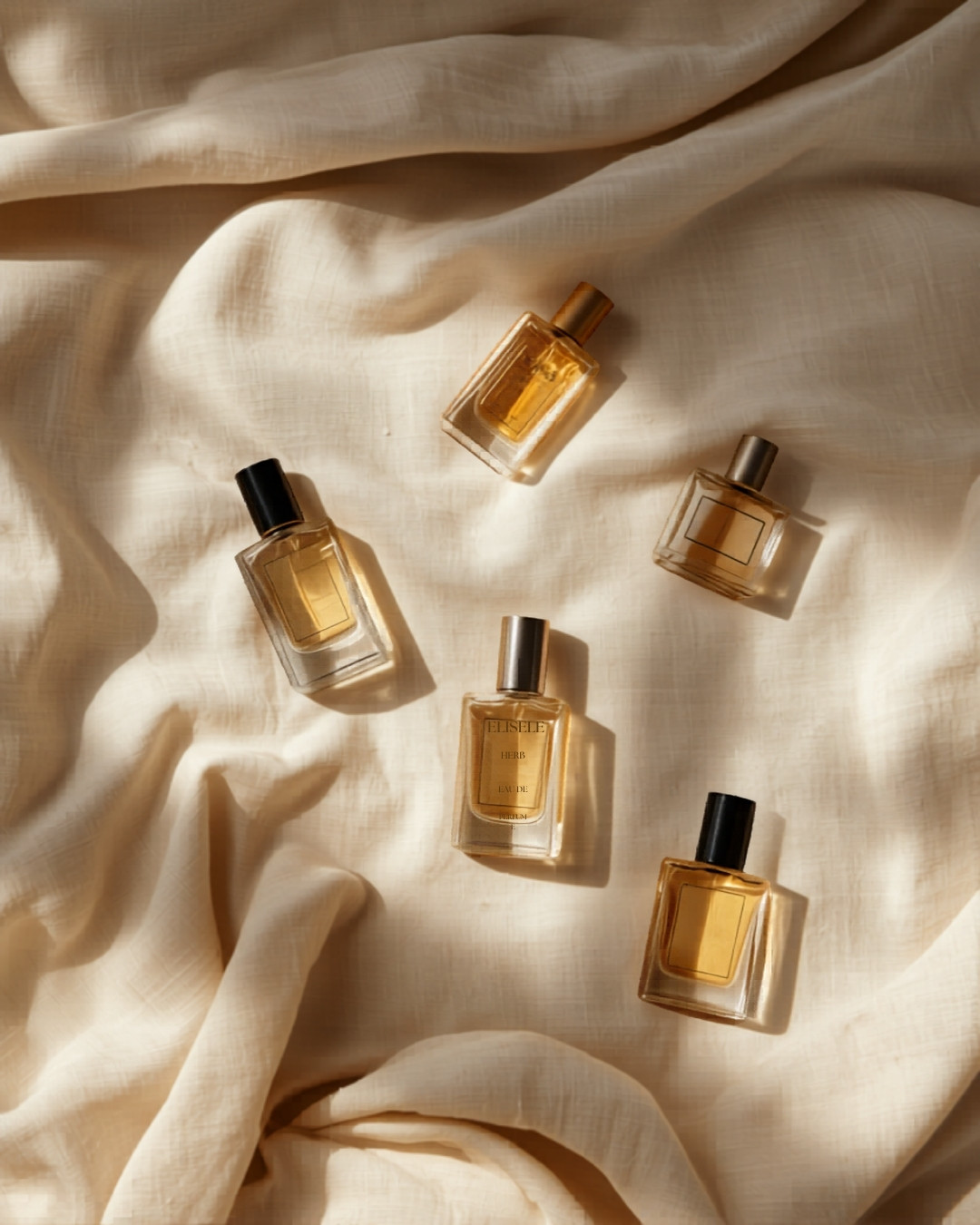 Budget-friendly fragrance bottles on linen